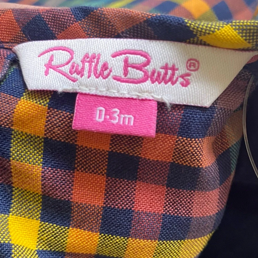 NWT RuffleButts Harvest Rainbow Gingham Long Sleeve Smocked Bubble Romper, 0-3M
